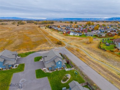 Discover modern Montana living at 817 Milky Way Drive Unit B in on Cottonwood Hills Golf Course - Cottonwood Hills in Montana - for sale on GolfHomes.com, golf home, golf lot