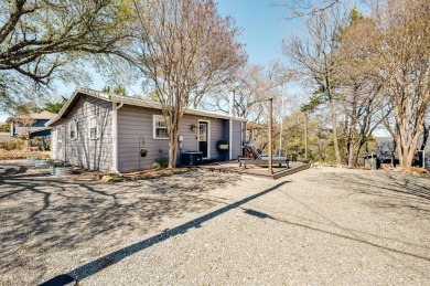 Nestled in a peaceful, wooded setting, this charming 3-bedroom on Tanglewood Resort in Texas - for sale on GolfHomes.com, golf home, golf lot