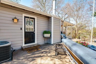 Nestled in a peaceful, wooded setting, this charming 3-bedroom on Tanglewood Resort in Texas - for sale on GolfHomes.com, golf home, golf lot