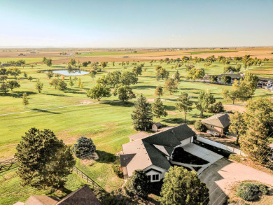 Exceptional Ranch Oasis with Water Rights & Mountain Views on Eaton Country Club in Colorado - for sale on GolfHomes.com, golf home, golf lot