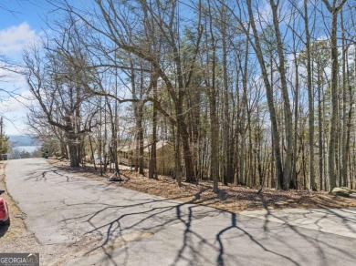 Perched among some of the highest elevations in Lake Arrowhead on The Highlands Course at Lake Arrowhead in Georgia - for sale on GolfHomes.com, golf home, golf lot