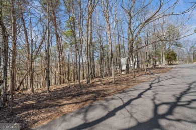Perched among some of the highest elevations in Lake Arrowhead on The Highlands Course at Lake Arrowhead in Georgia - for sale on GolfHomes.com, golf home, golf lot