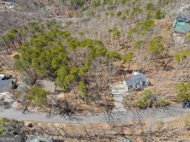 Perched among some of the highest elevations in Lake Arrowhead on The Highlands Course at Lake Arrowhead in Georgia - for sale on GolfHomes.com, golf home, golf lot