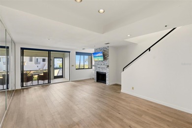 Start your day with glowing sunrise views across Sarasota Bay on Longboat Key Golf Club Resort in Florida - for sale on GolfHomes.com, golf home, golf lot