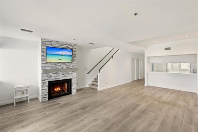 Start your day with glowing sunrise views across Sarasota Bay on Longboat Key Golf Club Resort in Florida - for sale on GolfHomes.com, golf home, golf lot