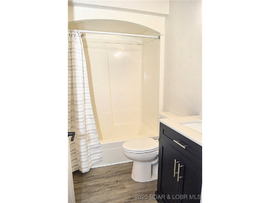 This 2 bedroom 2 bath condo lives LARGE with approximately 1,250 on Seasons Ridge At Four Seasons in Missouri - for sale on GolfHomes.com, golf home, golf lot