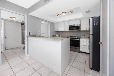 Welcome to this beautifully updated 2-bedroom, 2-bath corner on Cove Cay Country Club in Florida - for sale on GolfHomes.com, golf home, golf lot
