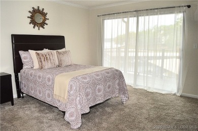 This 2 bedroom 2 bath condo lives LARGE with approximately 1,250 on Seasons Ridge At Four Seasons in Missouri - for sale on GolfHomes.com, golf home, golf lot