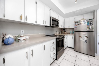 Welcome to this beautifully updated 2-bedroom, 2-bath corner on Cove Cay Country Club in Florida - for sale on GolfHomes.com, golf home, golf lot