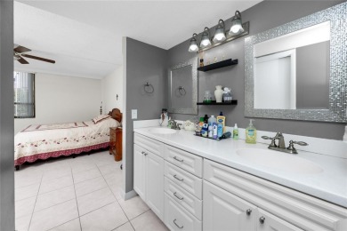 Welcome to this beautifully updated 2-bedroom, 2-bath corner on Cove Cay Country Club in Florida - for sale on GolfHomes.com, golf home, golf lot