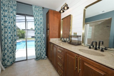 Discover comfort and privacy in this charming and updated on Rio Pinar Golf and Country Club in Florida - for sale on GolfHomes.com, golf home, golf lot
