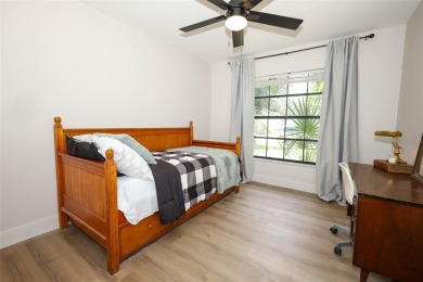 Discover comfort and privacy in this charming and updated on Rio Pinar Golf and Country Club in Florida - for sale on GolfHomes.com, golf home, golf lot