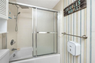 Welcome to this beautifully updated 2-bedroom, 2-bath corner on Cove Cay Country Club in Florida - for sale on GolfHomes.com, golf home, golf lot
