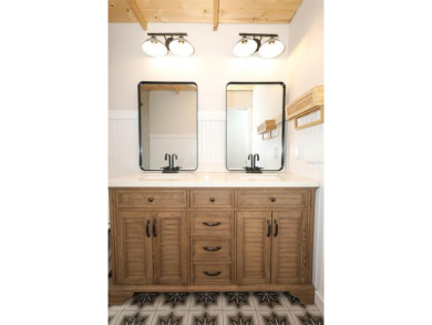 Discover comfort and privacy in this charming and updated on Rio Pinar Golf and Country Club in Florida - for sale on GolfHomes.com, golf home, golf lot