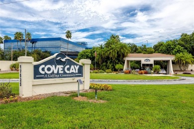 Welcome to this beautifully updated 2-bedroom, 2-bath corner on Cove Cay Country Club in Florida - for sale on GolfHomes.com, golf home, golf lot