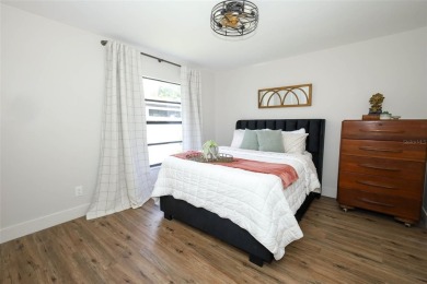 Discover comfort and privacy in this charming and updated on Rio Pinar Golf and Country Club in Florida - for sale on GolfHomes.com, golf home, golf lot