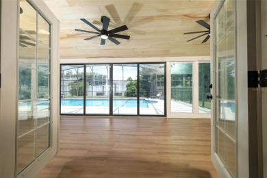 Discover comfort and privacy in this charming and updated on Rio Pinar Golf and Country Club in Florida - for sale on GolfHomes.com, golf home, golf lot