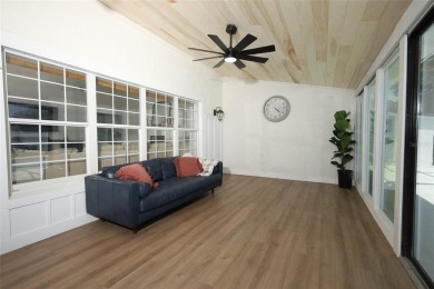Discover comfort and privacy in this charming and updated on Rio Pinar Golf and Country Club in Florida - for sale on GolfHomes.com, golf home, golf lot