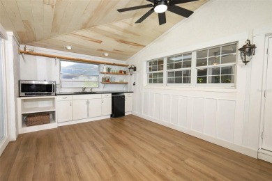 Discover comfort and privacy in this charming and updated on Rio Pinar Golf and Country Club in Florida - for sale on GolfHomes.com, golf home, golf lot