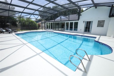 Discover comfort and privacy in this charming and updated on Rio Pinar Golf and Country Club in Florida - for sale on GolfHomes.com, golf home, golf lot