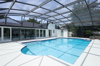 Discover comfort and privacy in this charming and updated on Rio Pinar Golf and Country Club in Florida - for sale on GolfHomes.com, golf home, golf lot