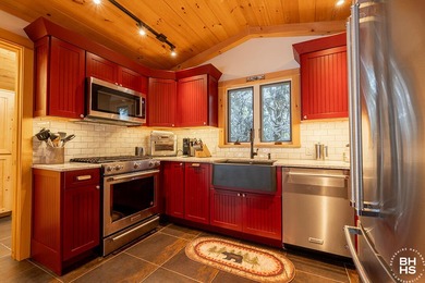 The idyllic and quintessential Adirondack Cottage that everyone on Whiteface Club and Resort in New York - for sale on GolfHomes.com, golf home, golf lot