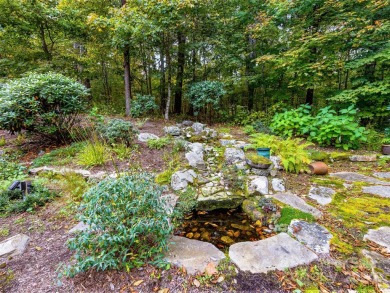 Nestled in a Fly-in/Fly-out community, this mountain retreat on Mountain Air Country Club in North Carolina - for sale on GolfHomes.com, golf home, golf lot
