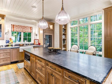 Nestled in a Fly-in/Fly-out community, this mountain retreat on Mountain Air Country Club in North Carolina - for sale on GolfHomes.com, golf home, golf lot