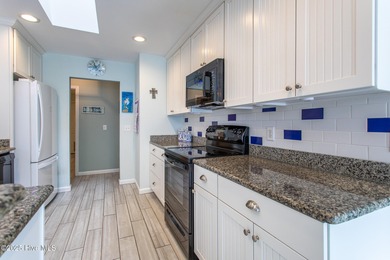 This gorgeous 3-bedroom, 2-bath home is located in The Albemarle on Sound Golf Links at Albemarle Plantation in North Carolina - for sale on GolfHomes.com, golf home, golf lot