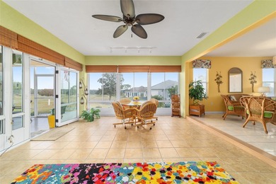 WOW is what you'll say as you step inside this custom Coral on Eagle Ridge At Spruce Creek Country Club in Florida - for sale on GolfHomes.com, golf home, golf lot