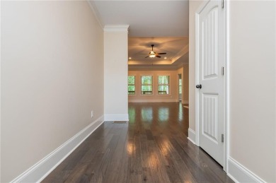 Peaceful living meets modern comfort in this stunning Canton on The Fairways at Laurel Canyon in Georgia - for sale on GolfHomes.com, golf home, golf lot
