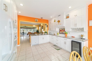 WOW is what you'll say as you step inside this custom Coral on Eagle Ridge At Spruce Creek Country Club in Florida - for sale on GolfHomes.com, golf home, golf lot