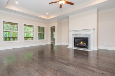 Peaceful living meets modern comfort in this stunning Canton on The Fairways at Laurel Canyon in Georgia - for sale on GolfHomes.com, golf home, golf lot