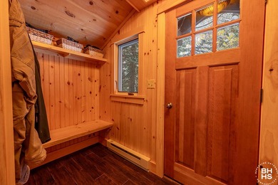 The idyllic and quintessential Adirondack Cottage that everyone on Whiteface Club and Resort in New York - for sale on GolfHomes.com, golf home, golf lot