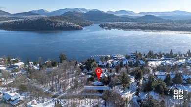 The idyllic and quintessential Adirondack Cottage that everyone on Whiteface Club and Resort in New York - for sale on GolfHomes.com, golf home, golf lot