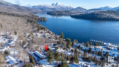 The idyllic and quintessential Adirondack Cottage that everyone on Whiteface Club and Resort in New York - for sale on GolfHomes.com, golf home, golf lot