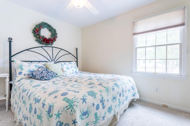 This gorgeous 3-bedroom, 2-bath home is located in The Albemarle on Sound Golf Links at Albemarle Plantation in North Carolina - for sale on GolfHomes.com, golf home, golf lot