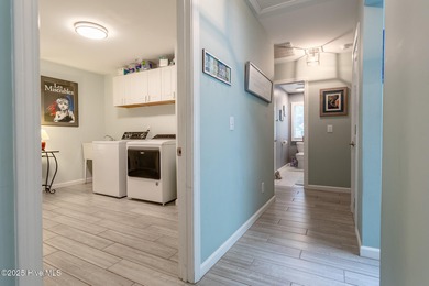 This gorgeous 3-bedroom, 2-bath home is located in The Albemarle on Sound Golf Links at Albemarle Plantation in North Carolina - for sale on GolfHomes.com, golf home, golf lot