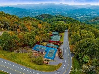 Nestled in a Fly-in/Fly-out community, this mountain retreat on Mountain Air Country Club in North Carolina - for sale on GolfHomes.com, golf home, golf lot