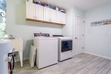 This gorgeous 3-bedroom, 2-bath home is located in The Albemarle on Sound Golf Links at Albemarle Plantation in North Carolina - for sale on GolfHomes.com, golf home, golf lot