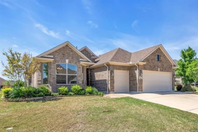 This beautiful fully bricked Briscoe model on a premium on Wildhorse Golf Club of Robson Ranch in Texas - for sale on GolfHomes.com, golf home, golf lot