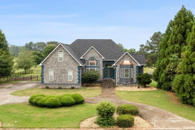This immaculate home is a golf lover's dream with it's prime on Canongate At Georgia National Golf Club in Georgia - for sale on GolfHomes.com, golf home, golf lot