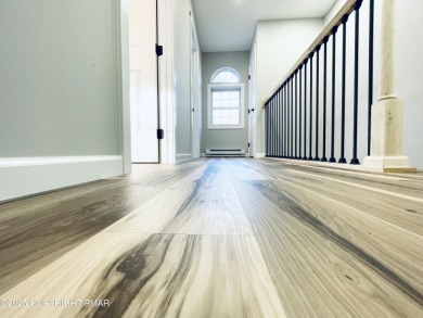 This MODERN, FULLY RENOVATED Colonial-Style Home with three on Pocono Farms Country Club in Pennsylvania - for sale on GolfHomes.com, golf home, golf lot