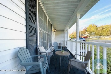 This MODERN, FULLY RENOVATED Colonial-Style Home with three on Pocono Farms Country Club in Pennsylvania - for sale on GolfHomes.com, golf home, golf lot