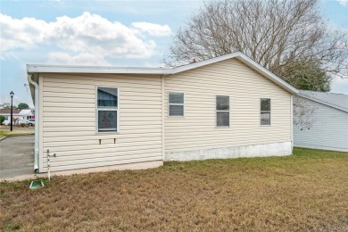 Welcome to this charming 2 bedroom 2 bathroom site built home on Lakes of Lady Lake Golf Course in Florida - for sale on GolfHomes.com, golf home, golf lot