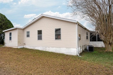 Welcome to this charming 2 bedroom 2 bathroom site built home on Lakes of Lady Lake Golf Course in Florida - for sale on GolfHomes.com, golf home, golf lot