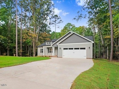 Beautiful custom built home in the highly sought after gated on River Golf and County Club at Lake Royale in North Carolina - for sale on GolfHomes.com, golf home, golf lot