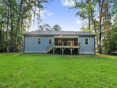 Beautiful custom built home in the highly sought after gated on River Golf and County Club at Lake Royale in North Carolina - for sale on GolfHomes.com, golf home, golf lot