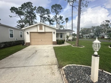 The lot rent for this home is $1,173.00/Monthly.    Fully on Del Tura Golf and Country Club in Florida - for sale on GolfHomes.com, golf home, golf lot