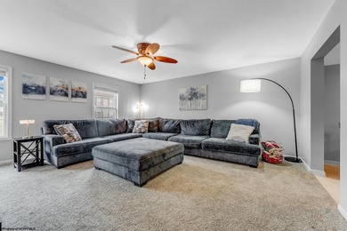 Discover your perfect retreat in this move-in-ready townhome on Meadow Ponds Golf and Country Club in West Virginia - for sale on GolfHomes.com, golf home, golf lot